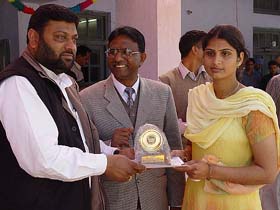 Naggal MLA Mr Jasbir Mallour gives away a prize