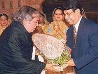 Pt Birju Maharaj being felicitated during the Heritage Festival in Patiala on Saturday.