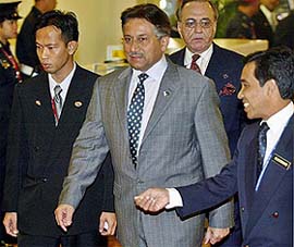 Pakistani President Pervez Musharraf arrives in Kuala Lumpur 