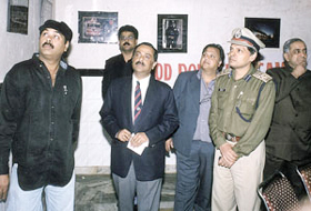 Joint Commissioner of Police Ranjeet Narain and DCP Arvind Deep view Kamal Sharmas photo exhibition.