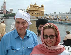 Mr Richard Giordano, Chairman of British Gas, and Lady Marguerite Giordano come out after paying obeisance at the Golden Temple