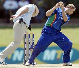 Namibia's Sarel Burger catches the ball