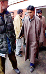 Jawahir Ahmed Malik, who was arrested in a fake currency case, being presented before the media