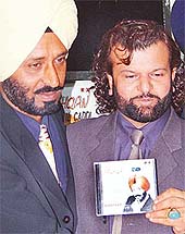 Punjabi singer Hans Raj Hans releases music album Aashqan Di Rail Gaddi of Hardeep (left) at the Chandigarh Press Club in Chandigarh on Monday