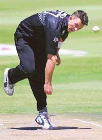 New Zealands Shane Bond delivers a ball 