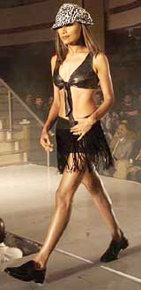 A model sashays down the ramp