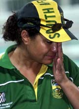 A disappointed South African fan weeps after rain forced a draw in their World Cup match against Sri Lanka 