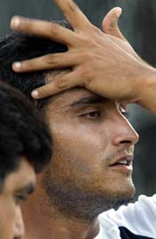 Indian captain Sourav Ganguly wipes his forehead after batting at the nets