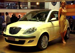 Miss "Suisse Romande" Elodie Boiron presents the new Lancia Y car at the Geneva car show