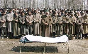 Villagers offer funeral prayers to school teacher Abdul Rashid Mir