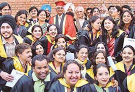 Students of the Government College of Art, Sector 10, with Prof R.B. Bhaskaran, Chairman of the National Academy of Art, after the annual convocation of the college in Chandigarh on Friday. 