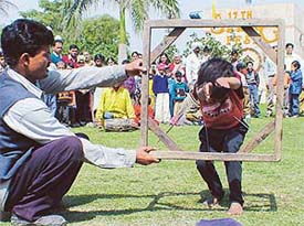 A child artiste enthralls the crowd at Spring Fest 2003 held at Town Park