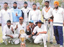 The team of the Double Deckor Club that won the trophy in the first Dr B.R. Ambedkar Memorial Cricket Tournament 