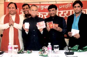 Union Minister of State for Home I. D. Swami releases the audio cassette of Swami Surendra Budhiraja