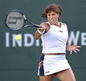 Second-seeded Jennifer Capriati returns a shot to Elena Dementieva of Russia 
