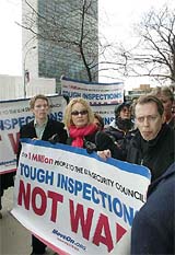 Actors Ethan Hawke, left, Jessica Lange, of Artists United to Win Without War, and Steve Buscemi, right, join members of Win Without War, MoveOn.org and the American Friends Service Committee, outside the United Nations Hadquarters