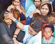 The wailing mother of Priyanka (inset), who was found murdered at her residence at Darua village in Chandigarh on Wednesday.
