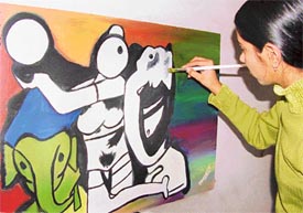 Harneet "records" a painting of M.F. Husain