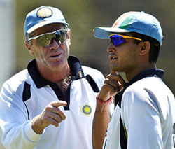 Indian captain Saurav Ganguly and coach John Wright share a chat during a practice session 