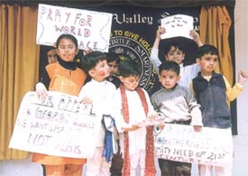 Kids from Children's Valley carrying anti-war banners