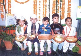 Children of Mother's Pride, Deepali and Punjabi Bagh branches, with basketful of messages