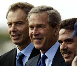 British Prime Minister Tony Blair stands with the US President George W Bush and Spanish Prime Minister Jose Maria Aznar