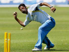 Mohammad Kaif aims at the stumps during a practice session in Durban