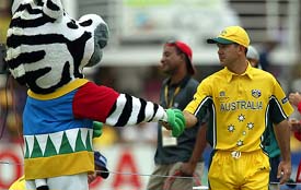 Australian captain Ricky Ponting shakes hand with the cricket World Cup mascot