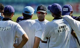 Indian captain Saurav Ganguly speaks to teammates during a practice session