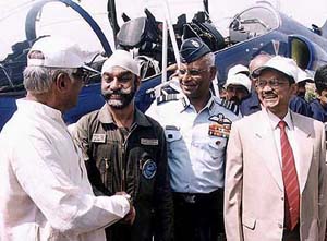 Defence Minister George Fernandes congratulates the Chief Test Pilot of HAL