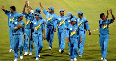 Jubiliant Indian players acknowledge crowds' applause after beating Kenya