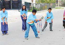 Children gear up for the cricket World Cup final, in Ludhiana