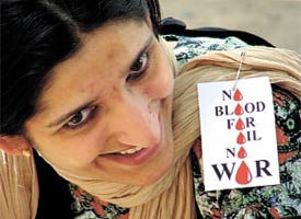 A CPM activist during the partys protest against the US war on Iraq at Teen Murti