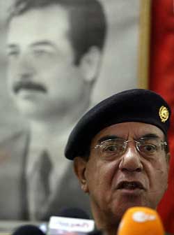 Iraqi Information Minister Mohammad Saed El-Sahar speaks during a news conference in Baghdad