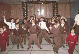 Students dance in the music Hall