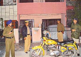 Security personnel of the Chandigarh police posted outside the house of cricketer Dinesh Mongia at Sector 40 