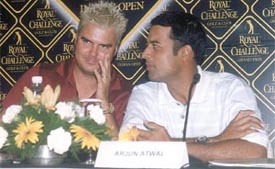 India-born Daniel Chopra of Sweden and Arjun Atwal exchange notes on the eve 