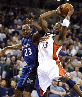 Washington Wizard's Michael Jordan tries to thwart a rebound 