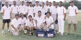 The Indian Airlines team with the Roshanara Cricket Tournament trophy