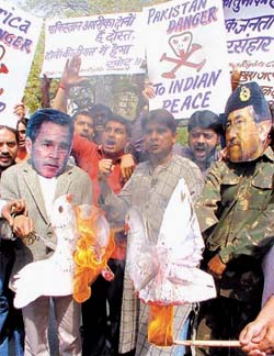 National Human Rights Council activists protest against the US war on Iraq and Pakistans interference in Jammu and Kashmir 