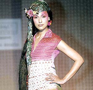 A model sports an outfit by Kavita Bhartiya during a fashion show 