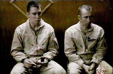 In this video image shown on Al-Jazeera television on Monday, Chief Warrant Officer Ronald D Young from Georgia and Chief Warrant Officer David S Williams from Florida are seen