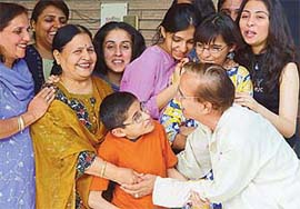 Mr Kidar Nath and his wife Kamla Rani, after being reunited with family