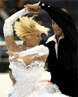 Shae-Lynn Bourne and Victor Kratz of Canada perform at the World Figure Skating championships 
