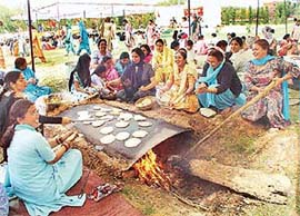 Women prepare langar on sadbhavna divas organised by the Panjab University Non-Teaching Employees Federation in Chandigarh
