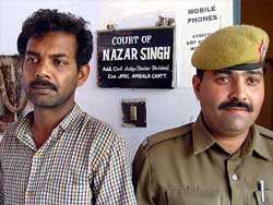 Pakistani spy Masood Akhtar Haidar outside a court in Ambala