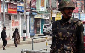 A jawan keeps vigil during a bandh