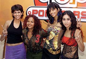 Members of Viva, an Indian all-girls band, pose for photographers