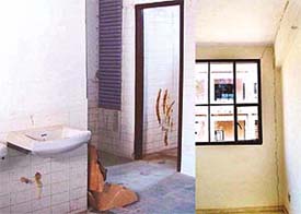 The incomplete and leaking bathrooms and walls having cracks at the National Institute of Nursing Education