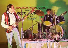 Members of the Triangle rock band present a classical rock number at Kala Gram, near Mani Majra, in Chandigarh